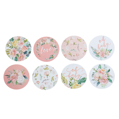 Set of decorative floral round stickers in pastel colors.