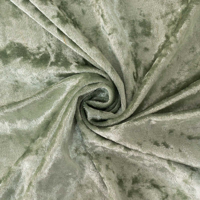 Soft green velvet fabric with a smooth texture and subtle sheen.