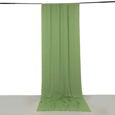 Green fabric backdrop draped elegantly for photography