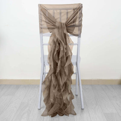 Brown chiffon chair sash draped elegantly on a white chair