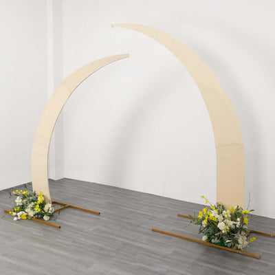 Decorative arch with floral arrangements on wooden bases
