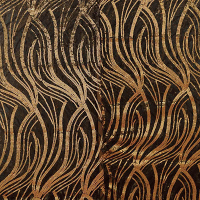 Textured fabric with a wavy gold and black pattern.