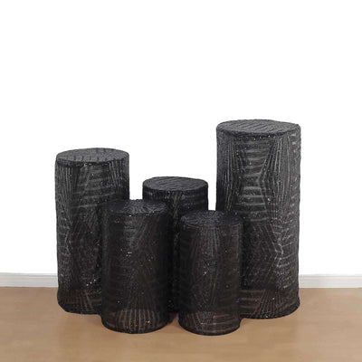Set of five black decorative wire baskets in various sizes