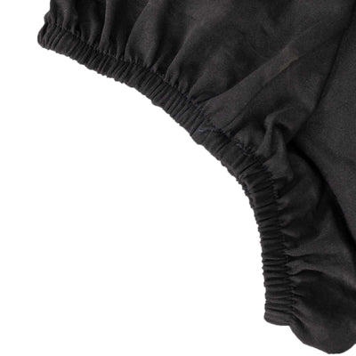 Black fabric with elastic gathering detail on the edge.