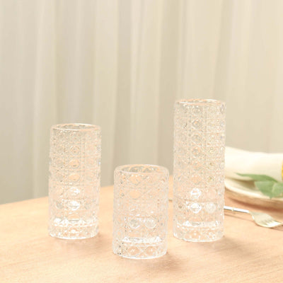 Set of three decorative glass candle holders.