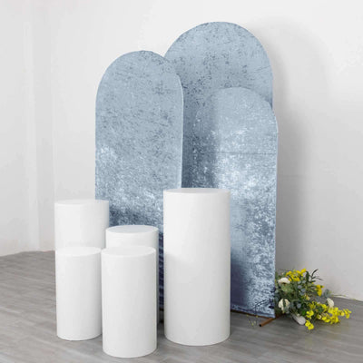 White and blue display stands arranged in a studio setting.