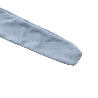 Light blue fabric strip on a plain background.