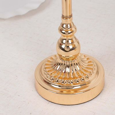 Gold decorative lamp base with intricate design details.