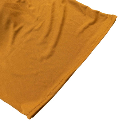 Soft mustard yellow fabric with a smooth texture