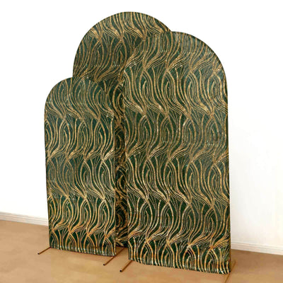 Decorative green and gold patterned room dividers in an arch shape
