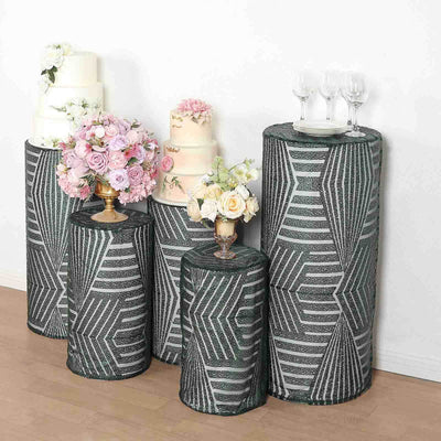Decorative table covers with geometric patterns in a styled setting.