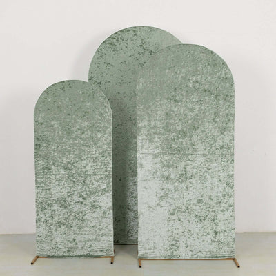 Set of three textured green arch panels on a plain backdrop