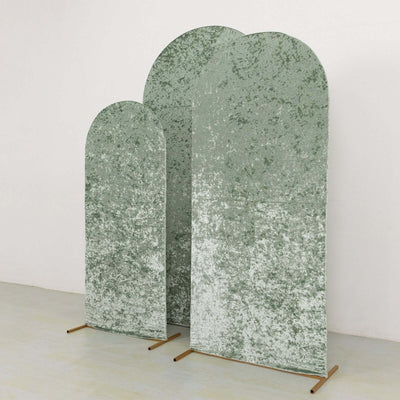 Textured green arch backdrops in varying heights on a plain backdrop.