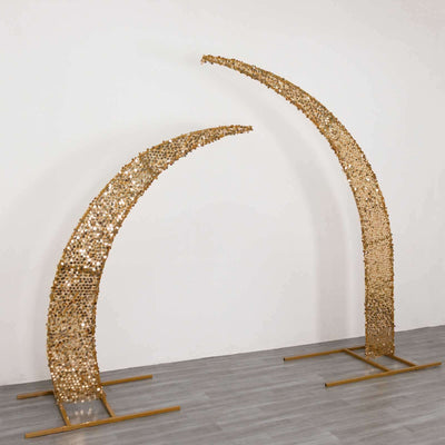 Gold decorative arches with a modern design for events and celebrations.