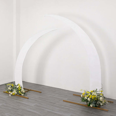 White arch with floral arrangements at the base for event decoration.