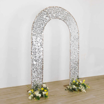 Decorative arch with floral arrangements for events or weddings.