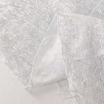 Shiny silver fabric with textured strands and a smooth backing.
