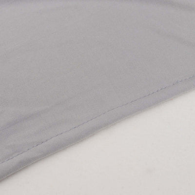 Close-up of a soft gray fabric showing stitching detail.