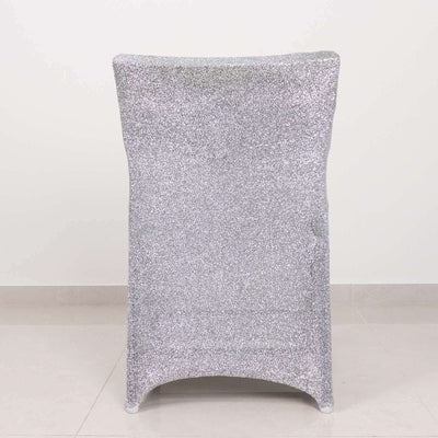 Silver glitter chair with a sleek design, isolated on a plain background.