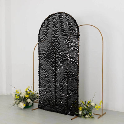 Decorative black arch panel with gold frame and floral accents