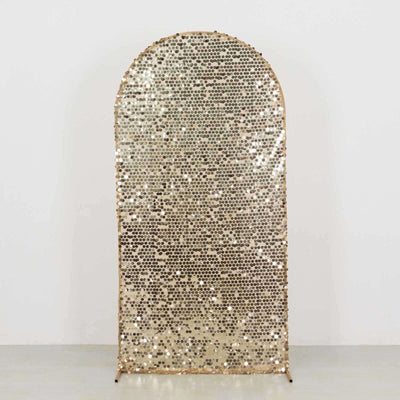 Gold sequin backdrop in an arch shape, perfect for events and photo shoots.
