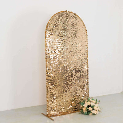 Gold sequin backdrop with a curved top, perfect for events and photoshoots.