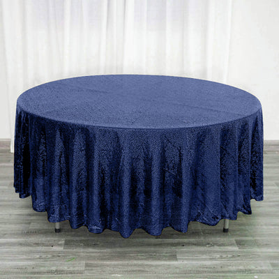 Navy round tablecloth draped elegantly over a table
