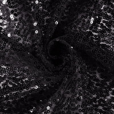 Black sequin fabric with a shimmering texture. #whtbkgd
