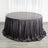 Black sequin tablecloth draping elegantly over a round table