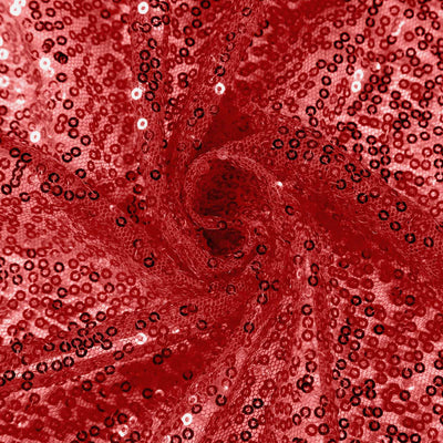 Red sequined fabric with a shimmering texture. #whtbkgd