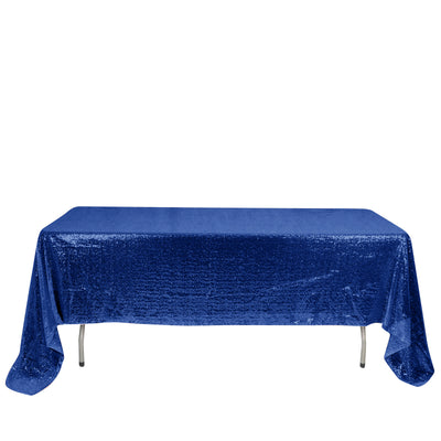 Blue sequin tablecloth draped over a table.