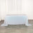 Shimmering iridescent tablecloth draped over a table in a studio setting.