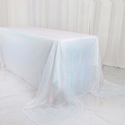 Iridescent sequin tablecloth draping elegantly over a table