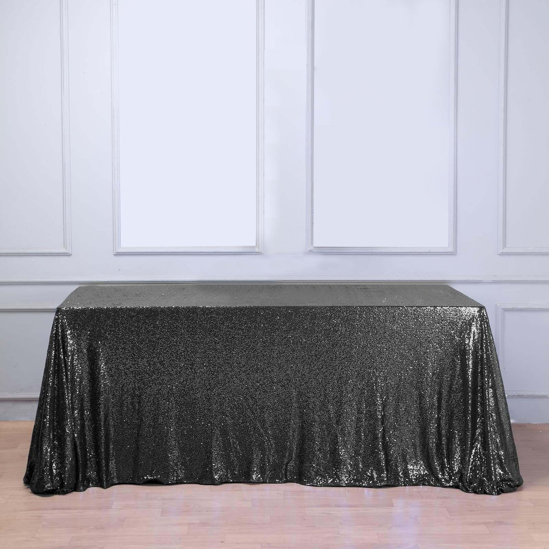 Black sequin tablecloth draped elegantly over a table