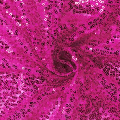 Pink sequin fabric with a swirling pattern. #whtbkgd
