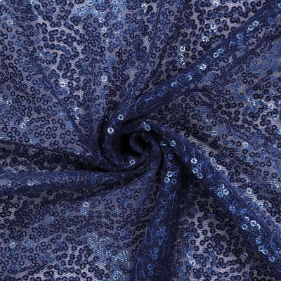 Navy blue sequin lace fabric with intricate patterns and shimmer. #whtbkgd