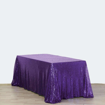 Purple sequin tablecloth draped over a table