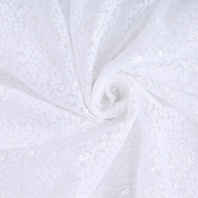 White sequin fabric in a spiral pattern. #whtbkgd