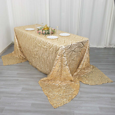 Gold sequin tablecloth elegantly draped on a table for events or celebrations.