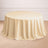 Beige round tablecloth with elegant draping on a wooden floor.
