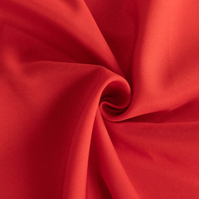 Red fabric showing smooth texture and vibrant color.