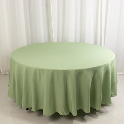 Green round tablecloth on a white backdrop