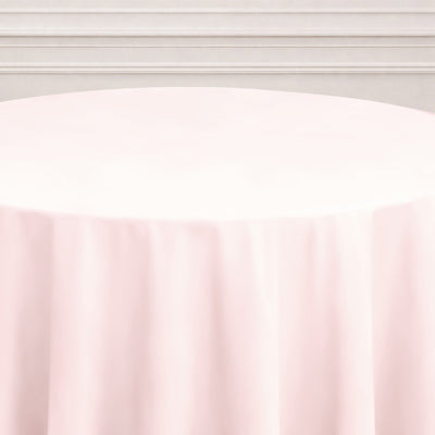 Round pink tablecloth on a plain background.