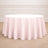 Pink round tablecloth draping elegantly over a table.