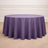 Round purple tablecloth on a wooden floor.