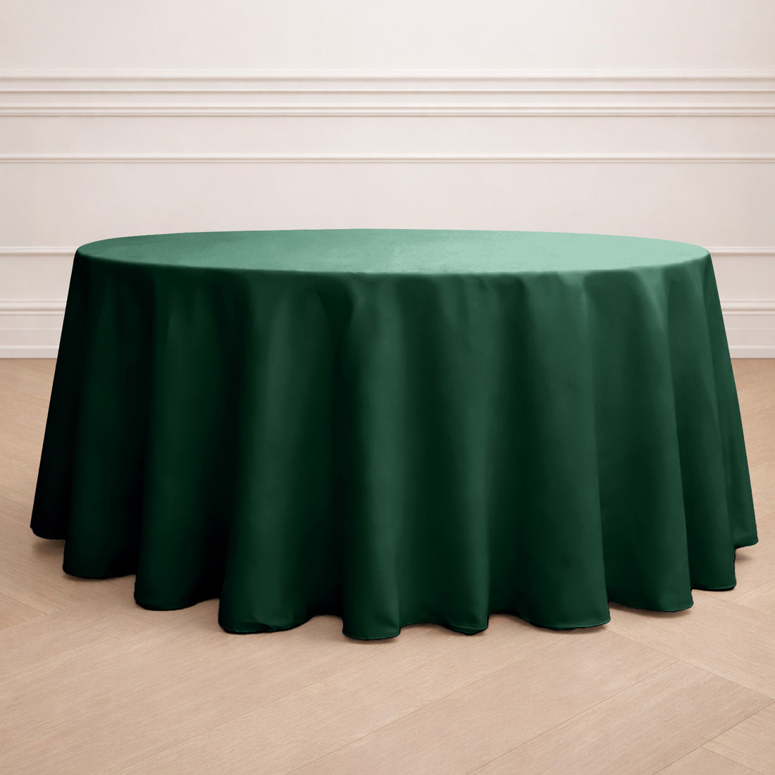Green round tablecloth draped elegantly on a table