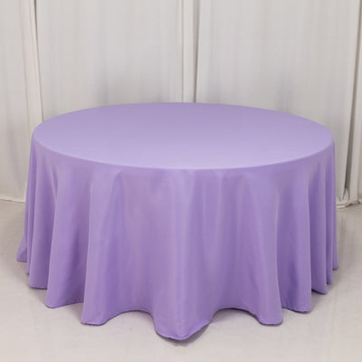 Purple round tablecloth draped elegantly over a circular table.
