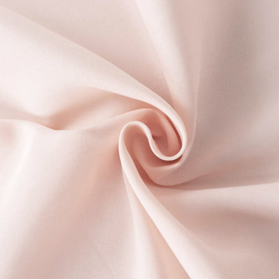Light pink fabric with soft texture and drape.