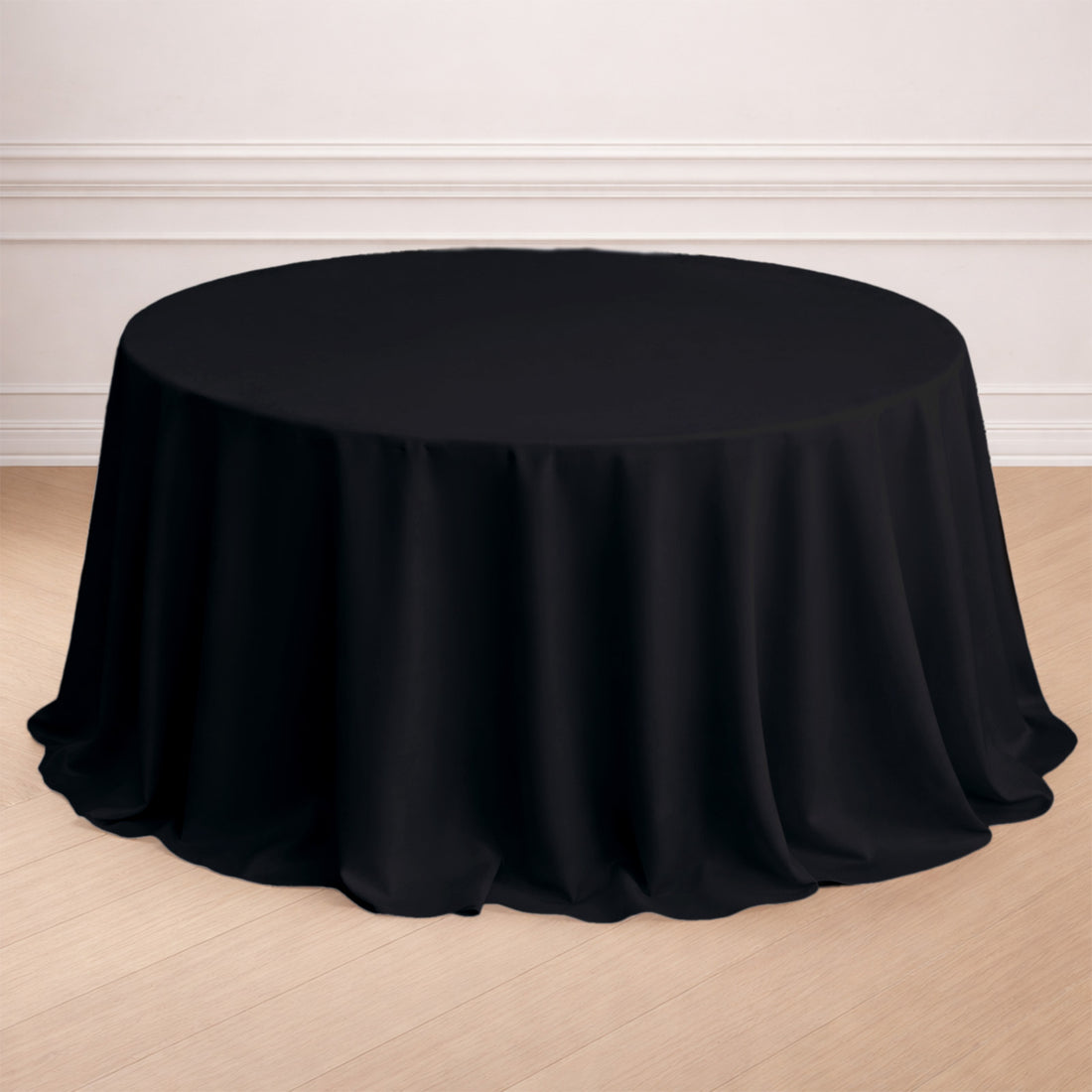 Black round tablecloth draping elegantly over a table