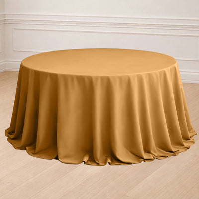 Round mustard tablecloth draped elegantly on a table.